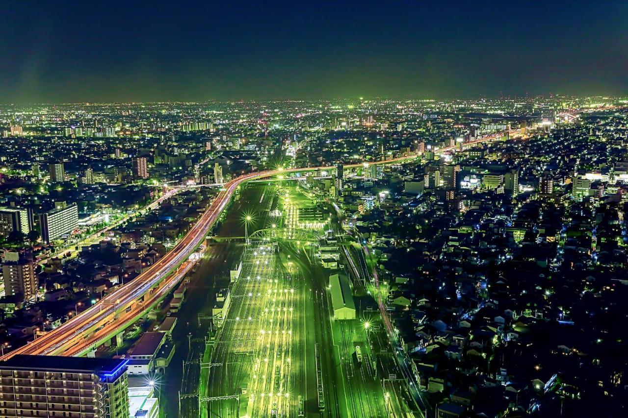นาโกยา ปริ้นซ์ โฮเต็ล สกาย ทาวเวอร์ Hotel นาโกย่า ภายนอก รูปภาพ Aerial view of the highway at night